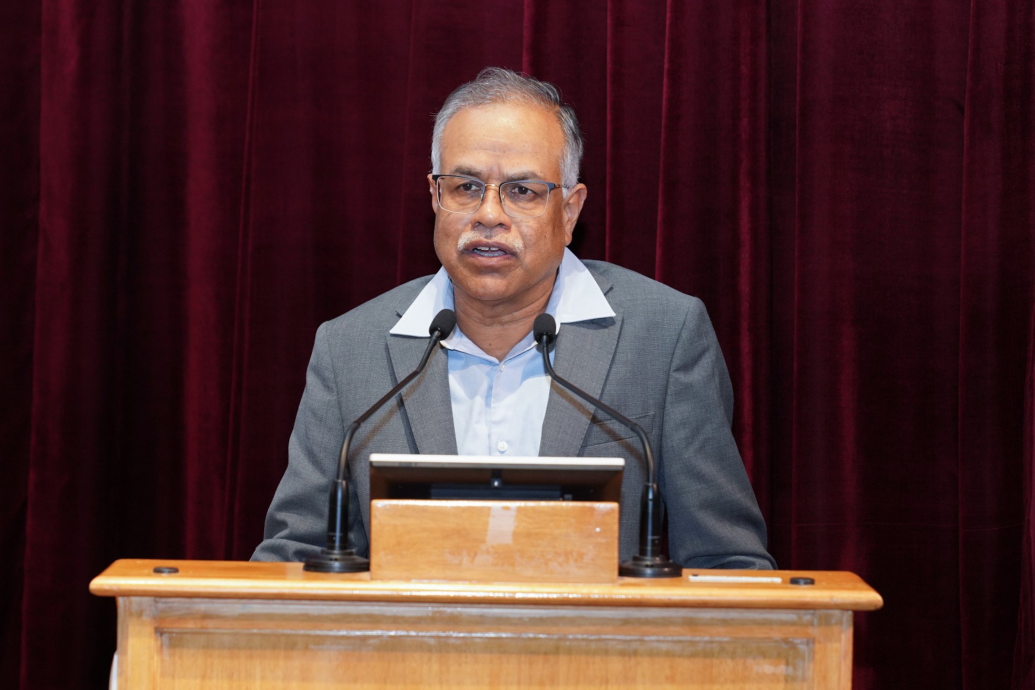 Prof. M Jayadev, Dean, Administration, Chairperson, Centre for Capital Markets & Risk Management, and faculty of the Finance & Accounting area, announces names of the recipients of the Long Service Awards presented to non-teaching IIMB staff, for completing 10 years of service at the Institute.