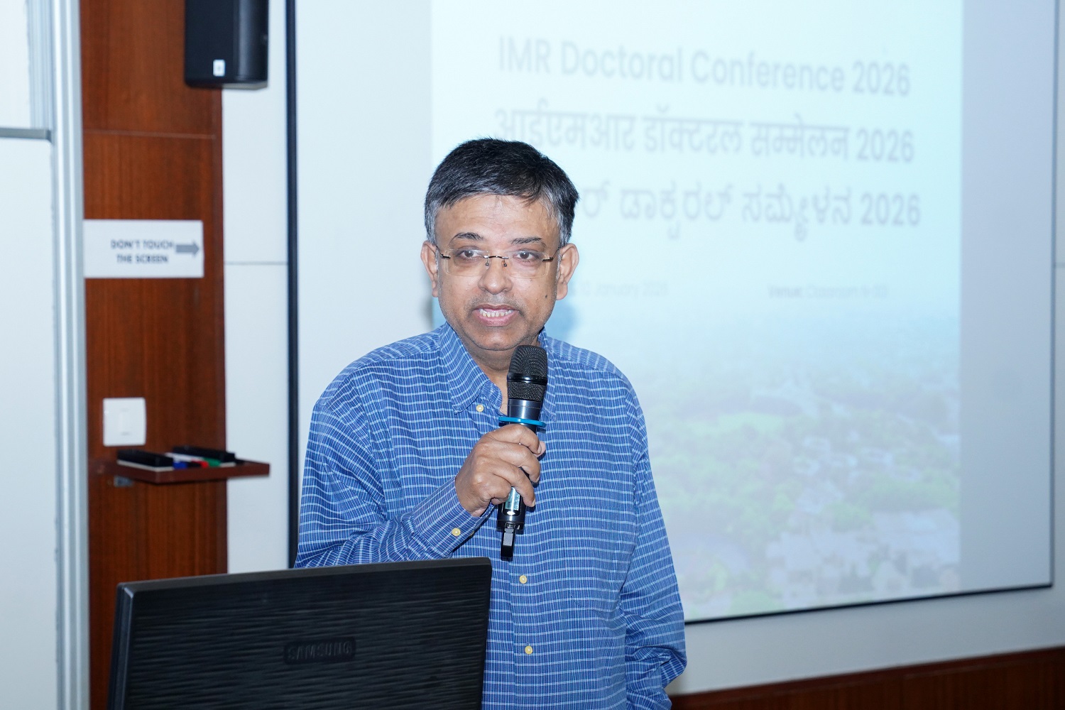 Conference Co-host Prof. Kanchan Mukherjee, Chairperson, Doctor of Philosophy and faculty in the Organizational Behavior & Human Resources Management area, points out how feedback received during paper presentations at the conference will help advance the papers towards publication, during his address.
