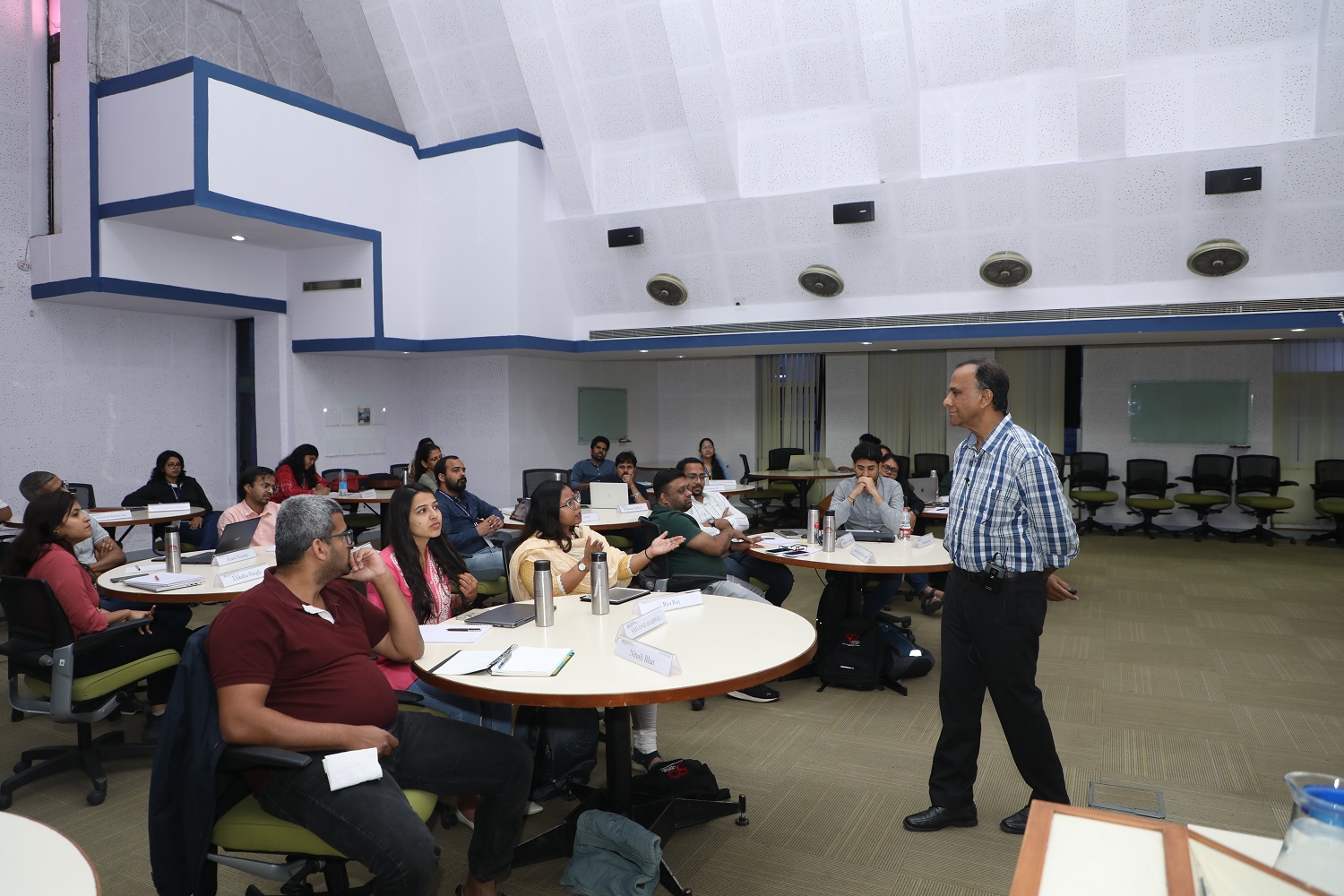 Prof. Mrityunjay Tiwary engaging the participants in a board game to help them learn management concepts. 