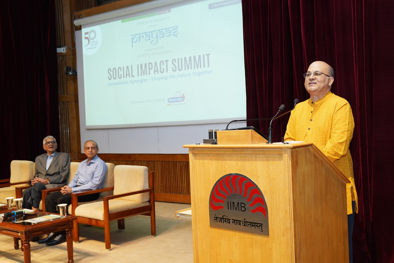 Prof. Rishikesha T Krishnan, Director, IIM Bangalore, delivers the welcome address at the social impact summit.