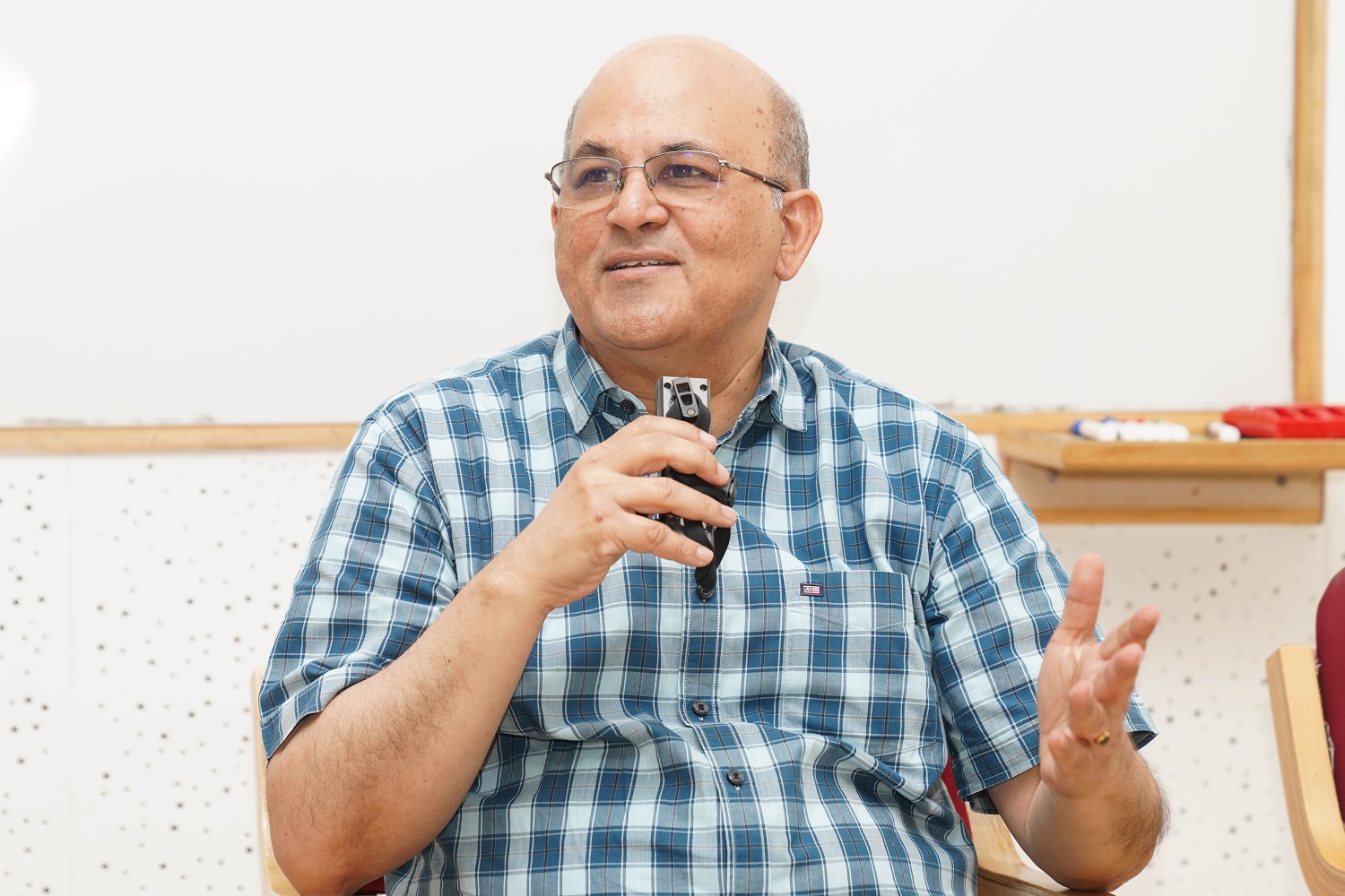 Prof. Rishikesha