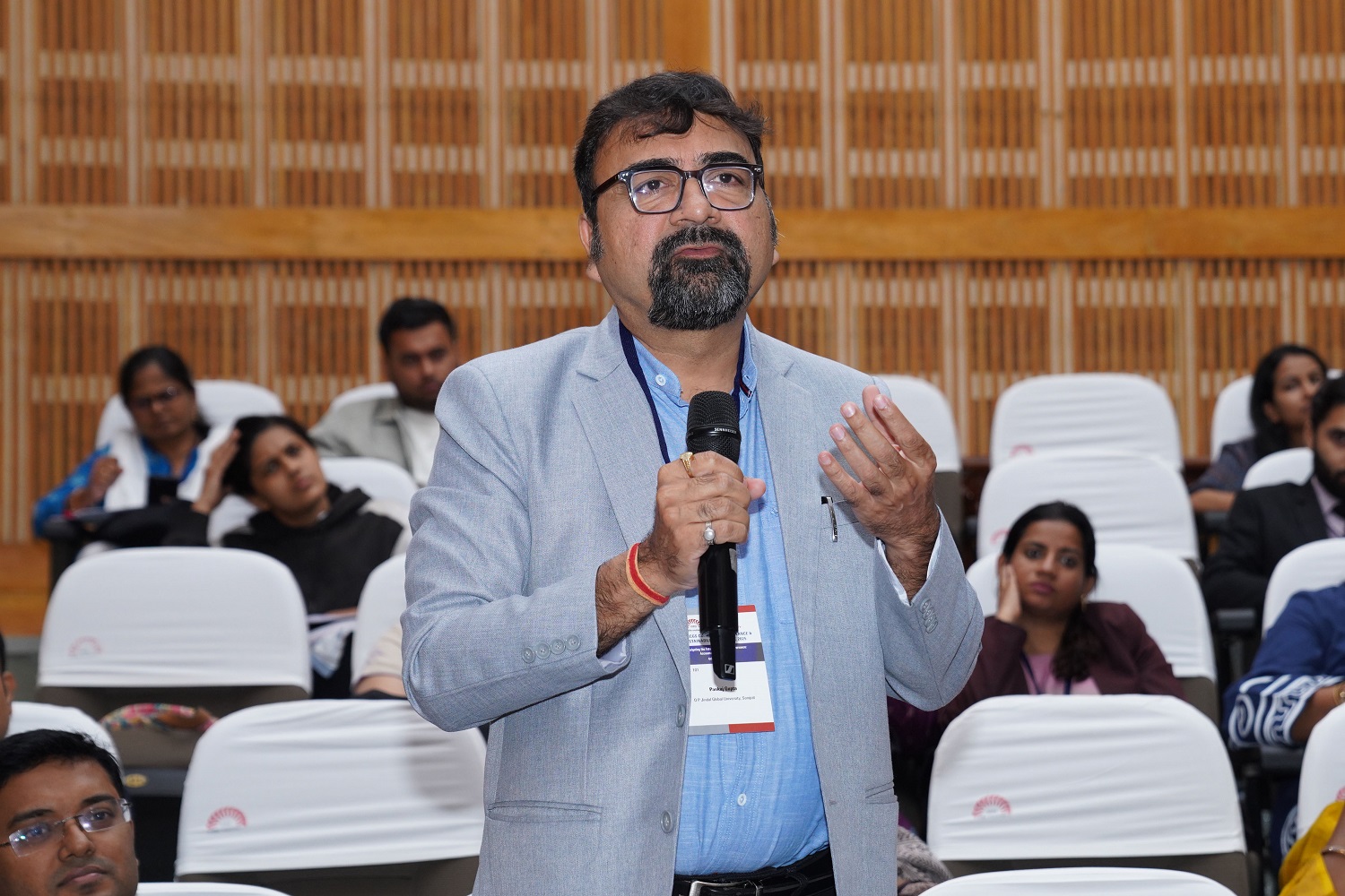 A participant engaging with the panellist members during the Q&A session.