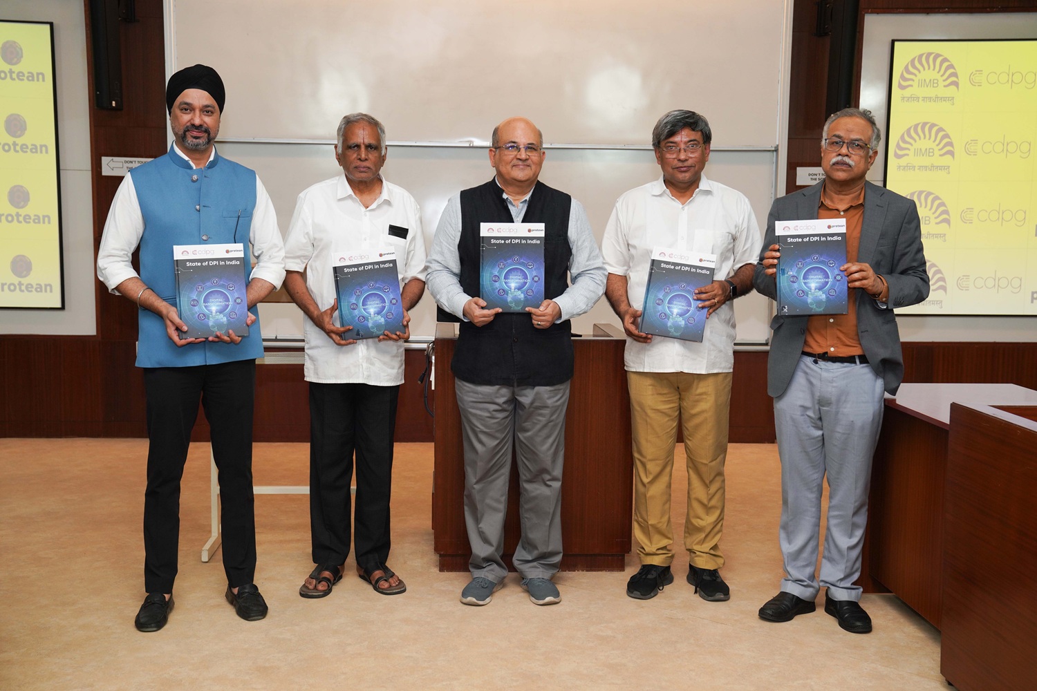 [L-R] The inaugural edition of the ‘State of DPI in India 2025’ report, commissioned by Protean eGov Technologies Ltd. and developed by the Center for Digital Public Goods (CDPG) at IIM Bangalore, was unveiled in the presence of Mr. Harpreet Singh Anand, CHRO, Protean; Prof. S Sadagopan, Former Director, IIITB; Prof. Rishikesha T Krishnan, Professor In-charge, New Campus and faculty of Strategy; Prof. R Srinivasan, Chairperson, CDPG; and Prof. M Jayadev, Dean of Administration and faculty of Finance & Accounting. 