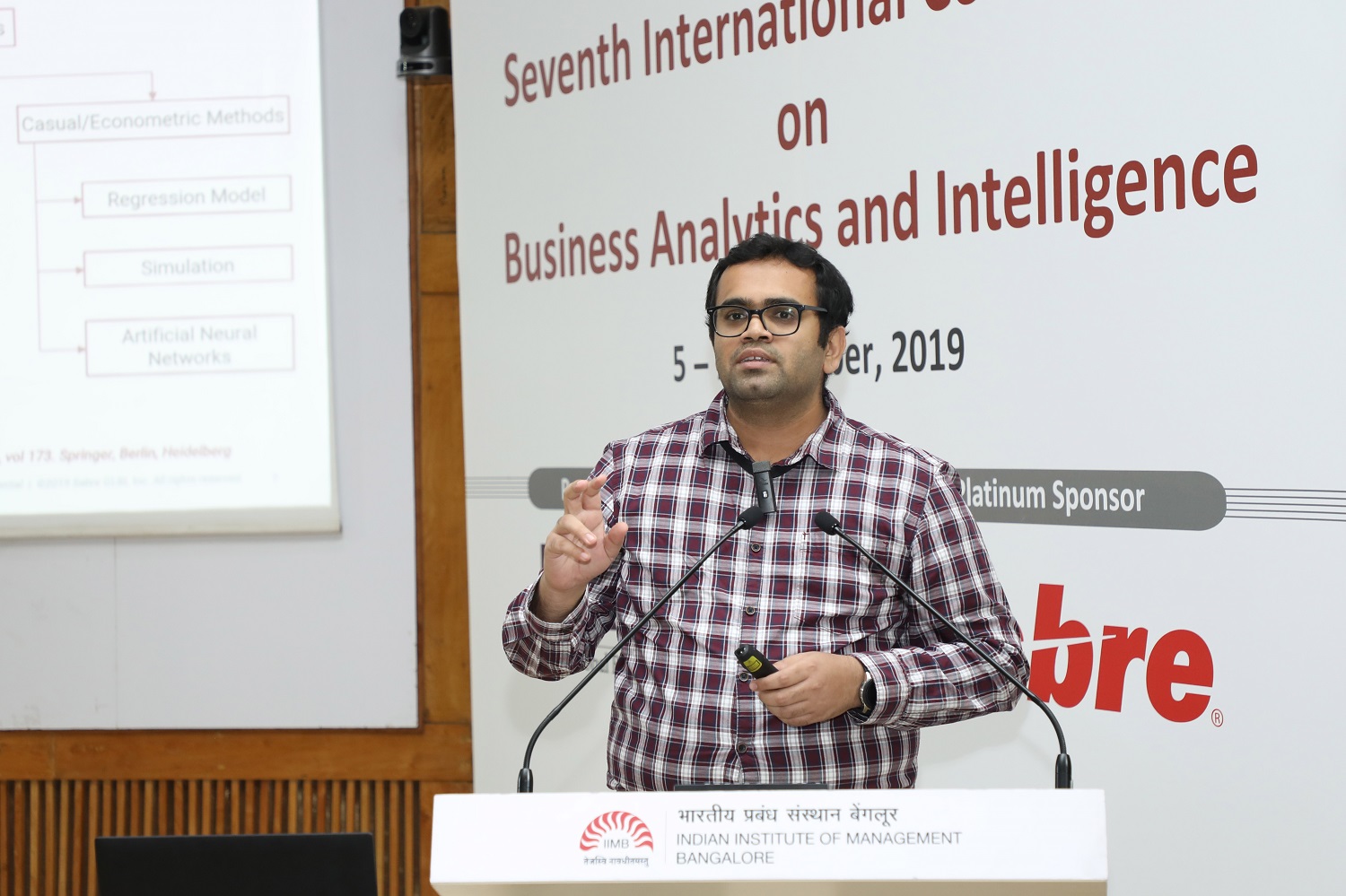 Shriguru Nayak, Senior Analyst at Sabre Airline Solutions, delivered a talk on ‘Passenger Market Size Forecasting in Airline Industry’ on the second day of the 7th International Conference on Business Analytics and Intelligence, currently being held at IIM Bangalore.