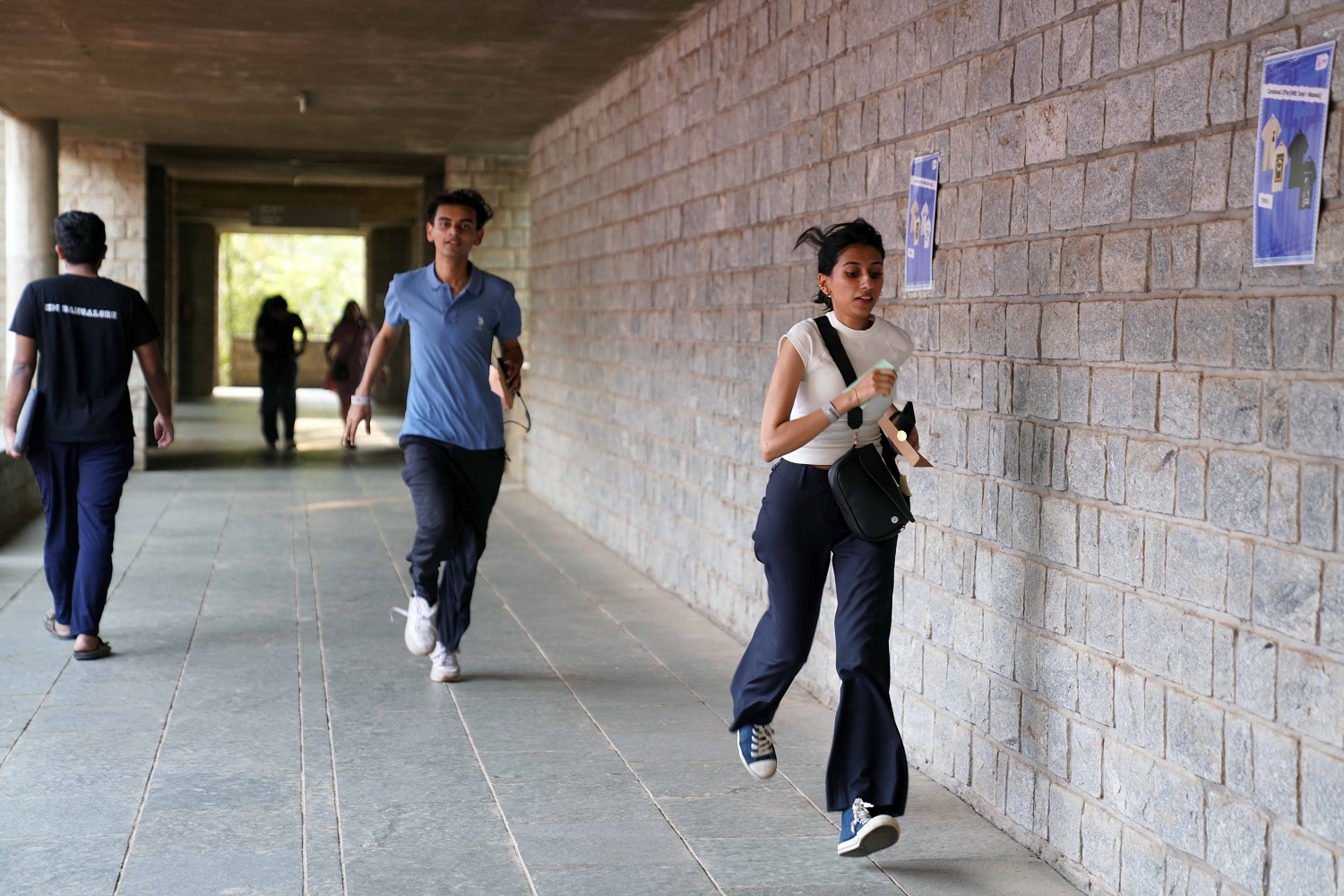 Participants navigating clues across campus during the multi-stage competition, Treasure Hunt at Unmaad 2026.