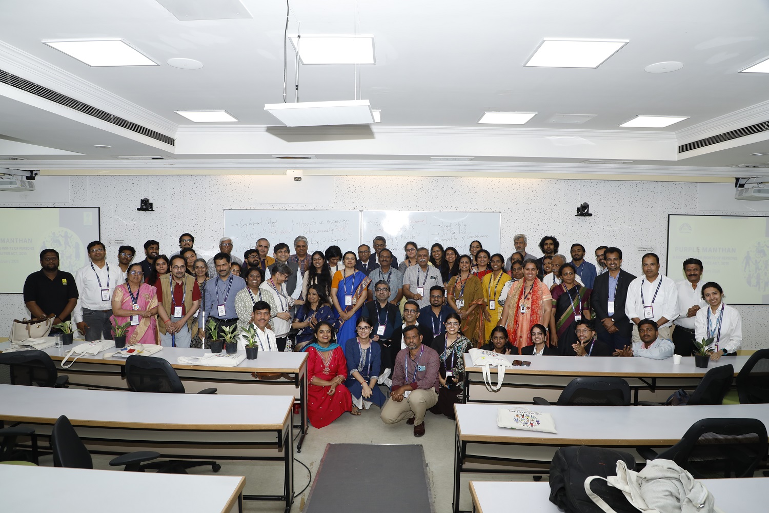 Participants, faculty members, and speakers, alongside members of ODI and the Association of People with Disability at Purple Manthan, hosted by IIMB.