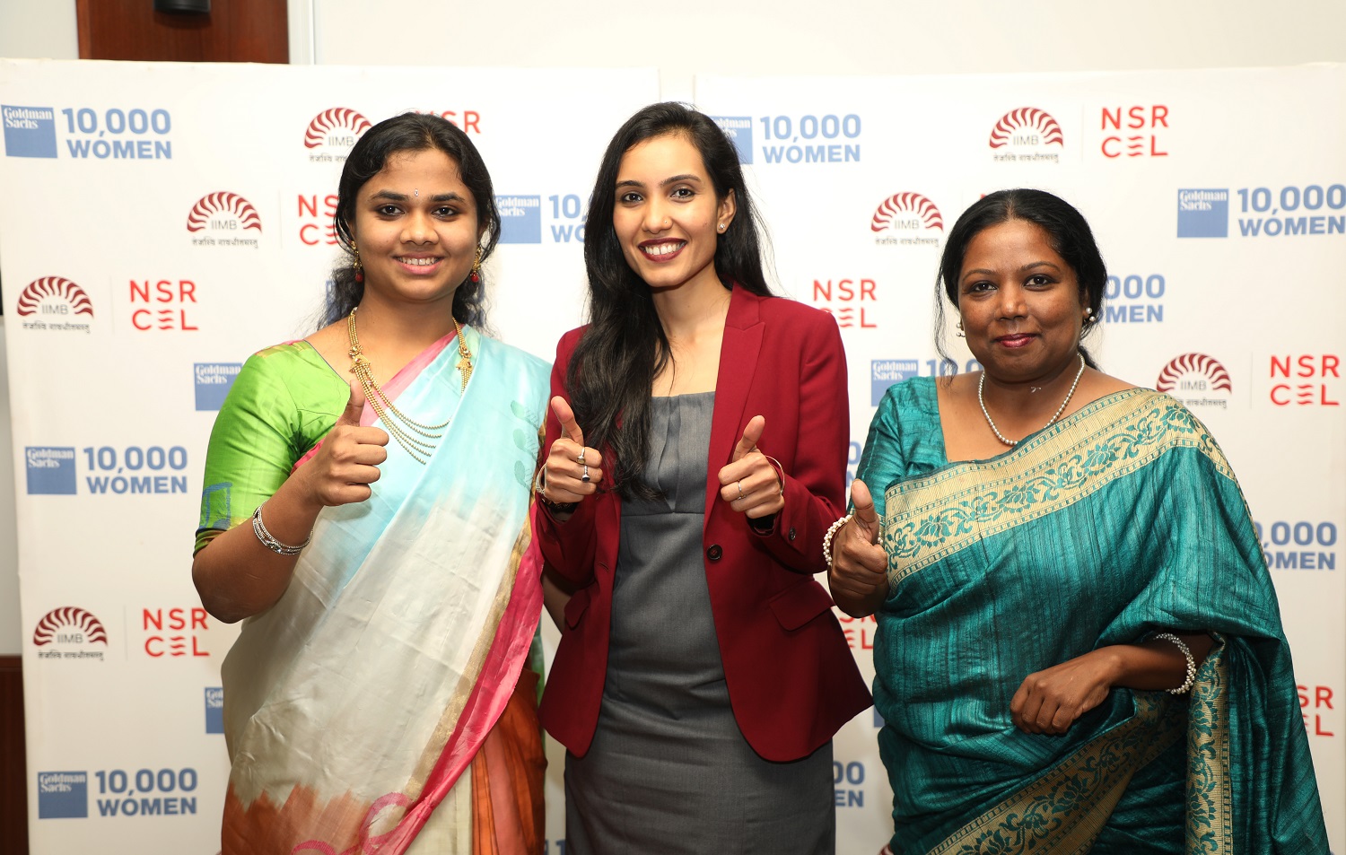 (L_R) Preethi Suresh from Sarang Auto Parts; Shikha Verma Thutheja from Studiouniforms.com and Ivy Manohara from Filmapia , receive the Business Growth Plan competition awards at the valedictory ceremony of the Goldman Sachs 10,000 Women Program at IIMB.