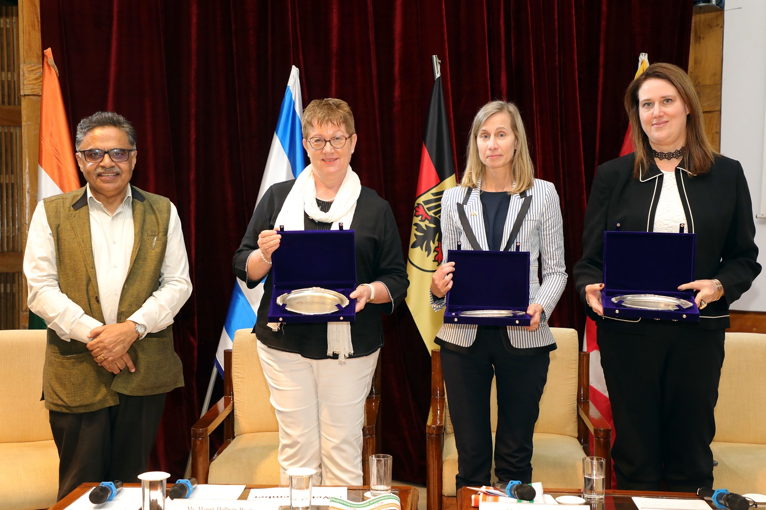 Prof. Abhoy K. Ojha, Chair, Israel Centre at IIMB, gives mementos to Ms. Margit Hellwig-Boette, Consul General of Germany, Ms. Nicole Girard, Consul General of Canada, and Ms. Dana Kursh, Consul General of Israel.