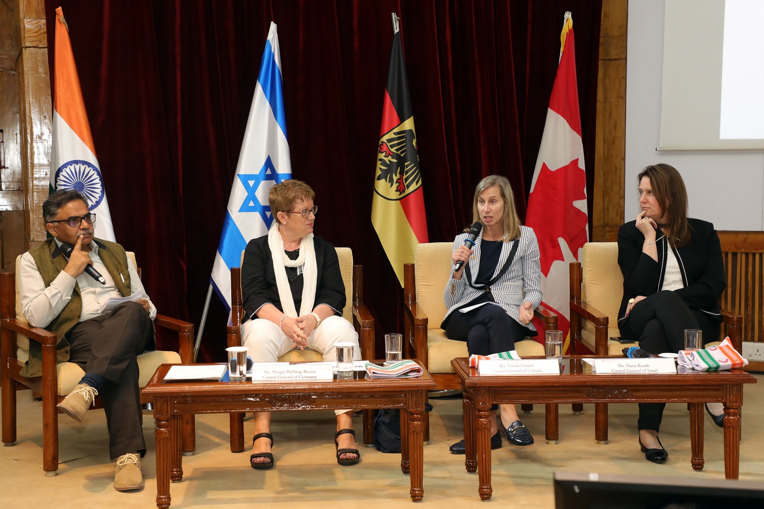 Prof. Abhoy K Ojha, Chair, Israel Centre at IIMB, Ms. Margit Hellwig-Boette, Consul General of Germany, Ms. Nicole Girard, Consul General of Canada, and Ms. Dana Kursh, Consul General of Israel, at the panel discussion.