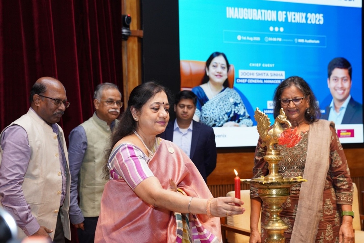 Inauguration lamp lighting of VENIX 2025 by Chief Guest Ms. Joohi Smitha Sinha, Chief General Manager, SBI; Guest of Honour, Shyam Unnikrishnan, Managing Partner, Bain & Co. India; Prof. Rajluxmi V. Murthy, Chairperson, Student Welfare; Prof. Jayadev M., Dean of Administration and Faculty of Finance & Accounting; and SD Aravendan, CAO, IIMB.