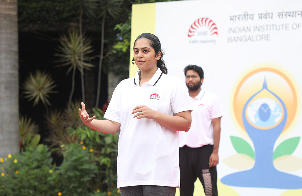 Yagnika Madhusudan, yoga instructor, offers an introduction before the commencement of the session.