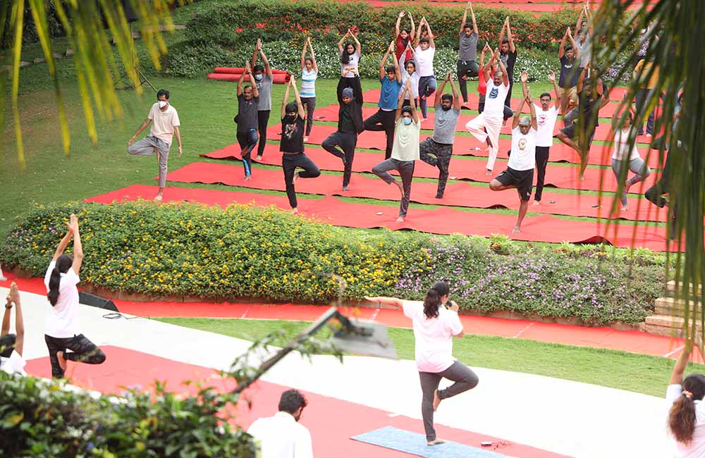 Students of IIMB participate in the 8th International Day of Yoga celebrations on campus.