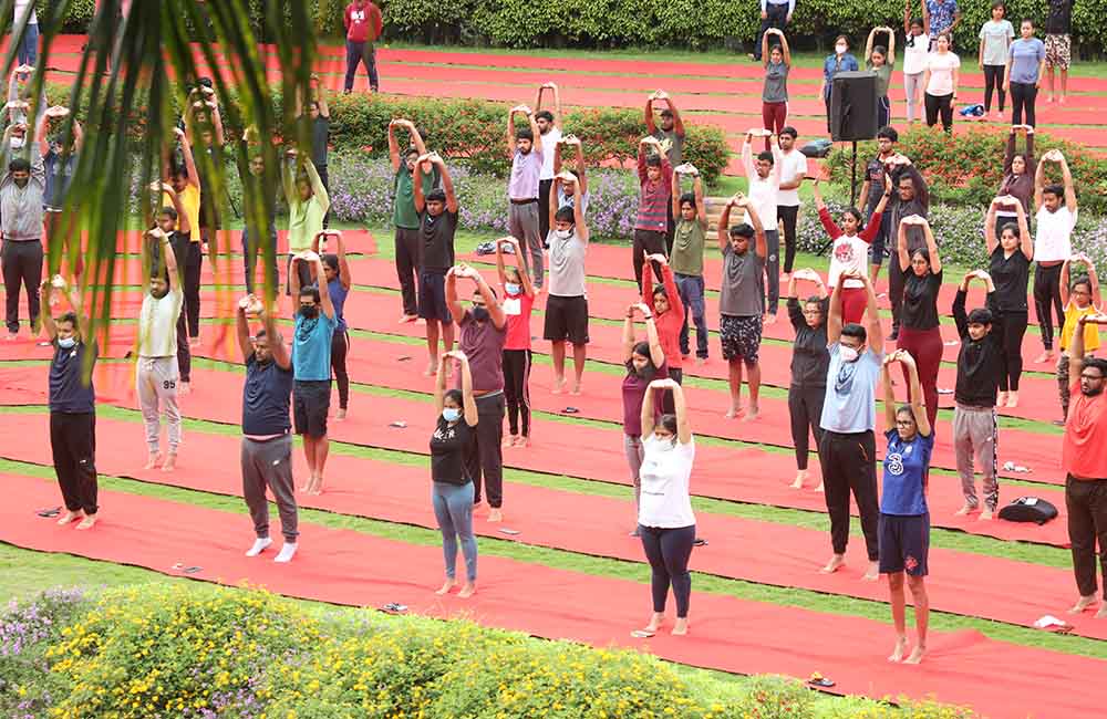 Students of IIMB participate in the 8th International Day of Yoga celebrations on campus.