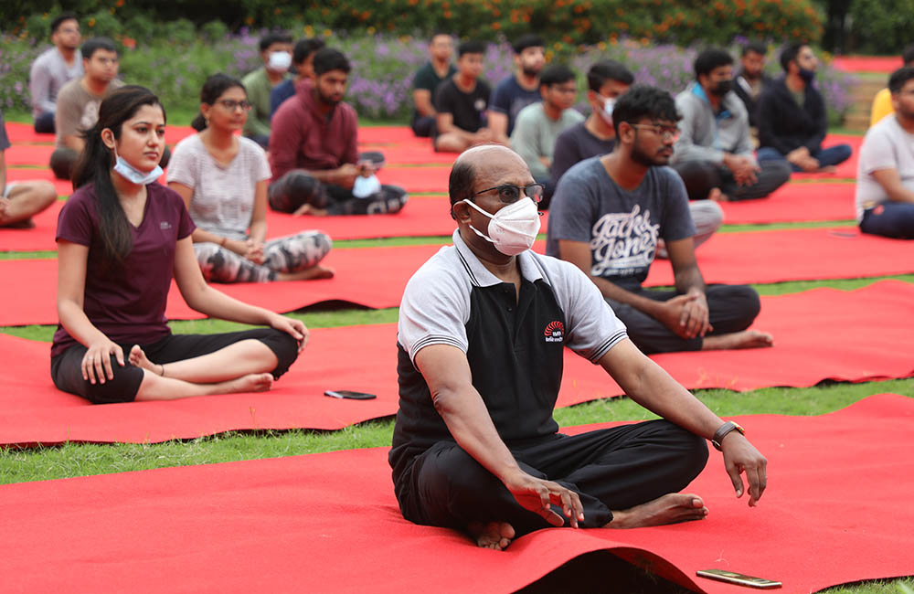 Students of IIMB participate in the 8th International Day of Yoga celebrations on campus.