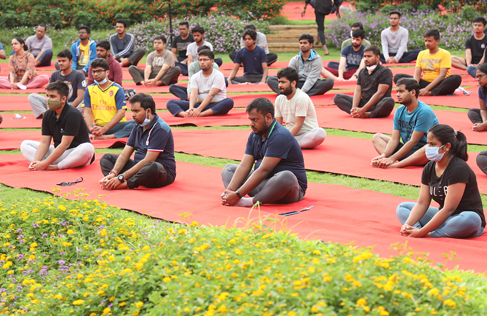 Students of IIMB participate in the 8th International Day of Yoga celebrations on campus.